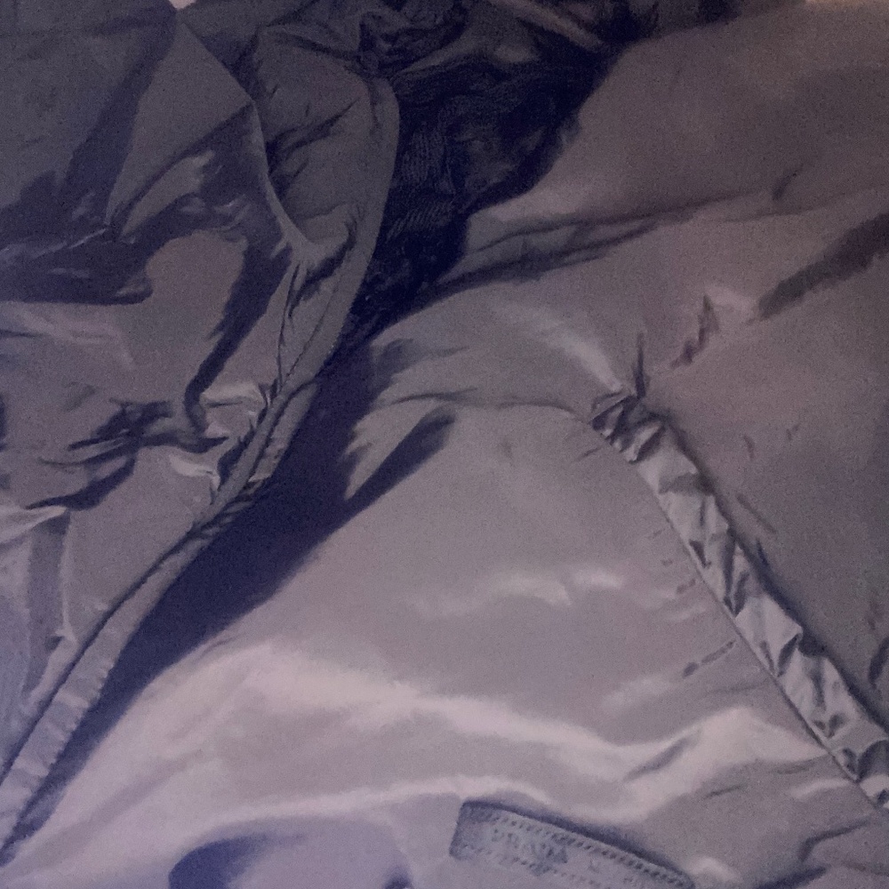 Prada jacket/ thin cool wind breaker all black with small patch on outsidepockeT